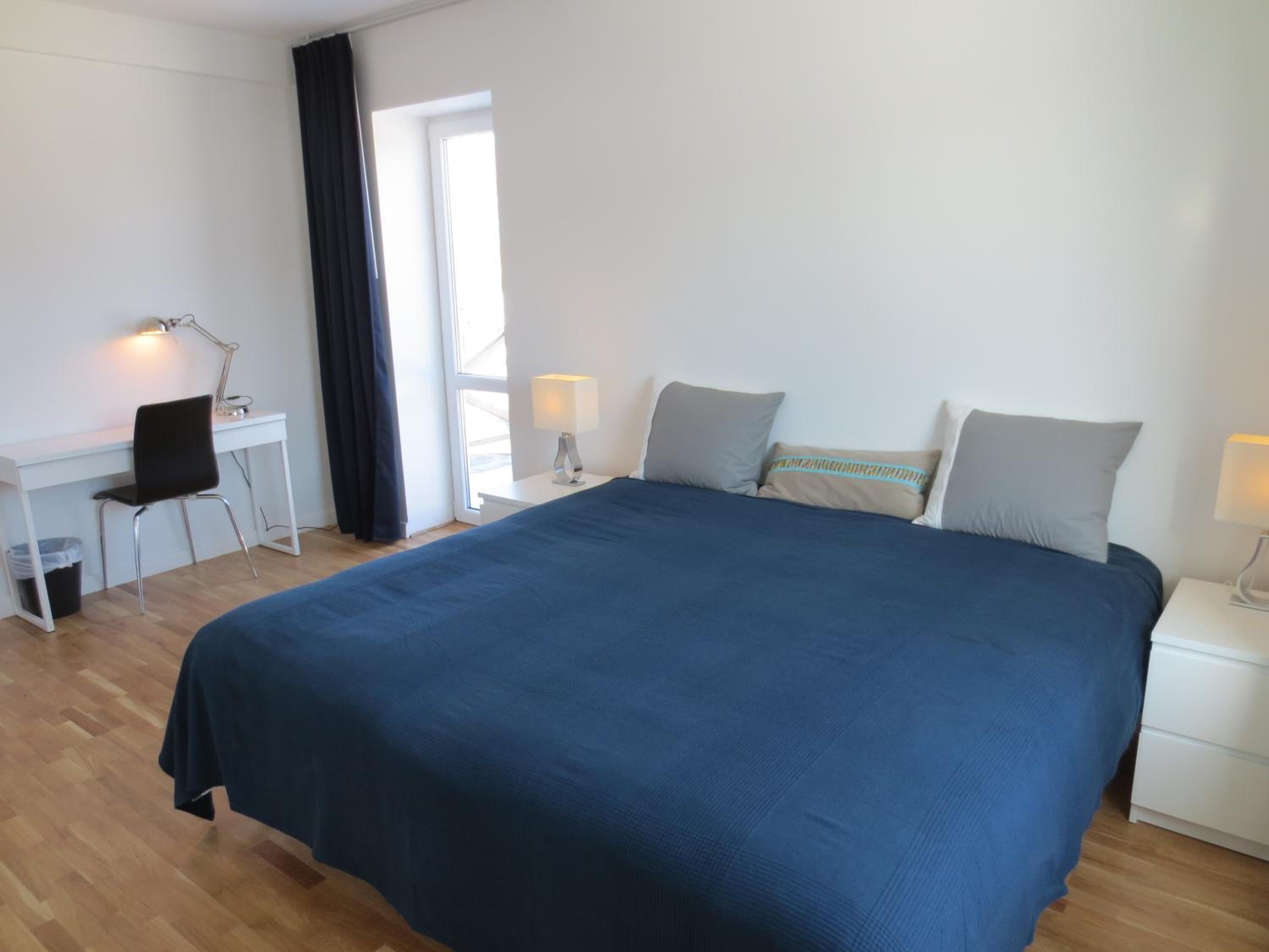 premium bedding, pillow-top beds, desk, laptop workspace