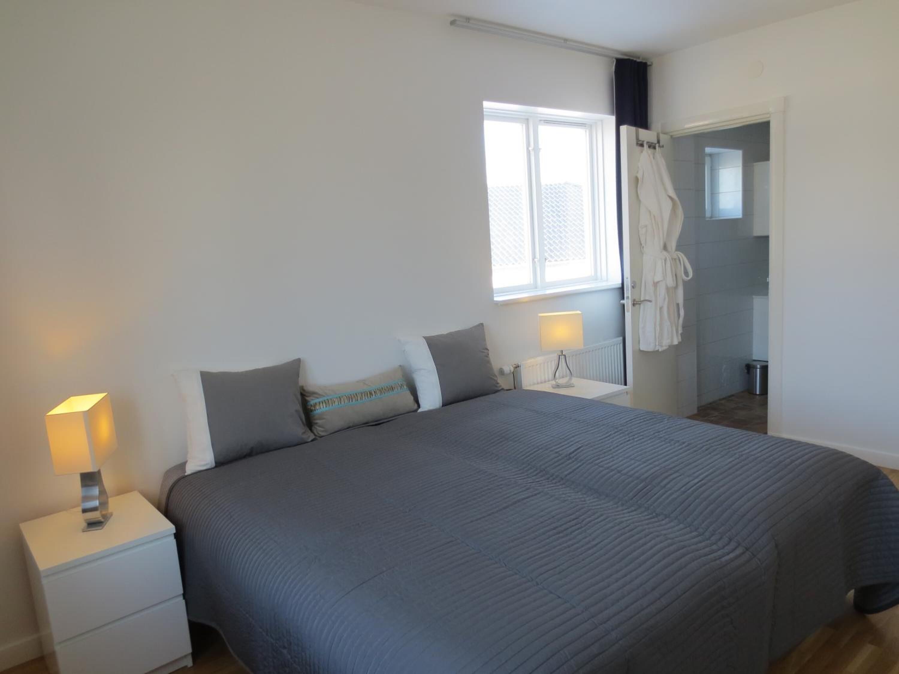 Premium bedding, pillowtop beds, desk, laptop workspace