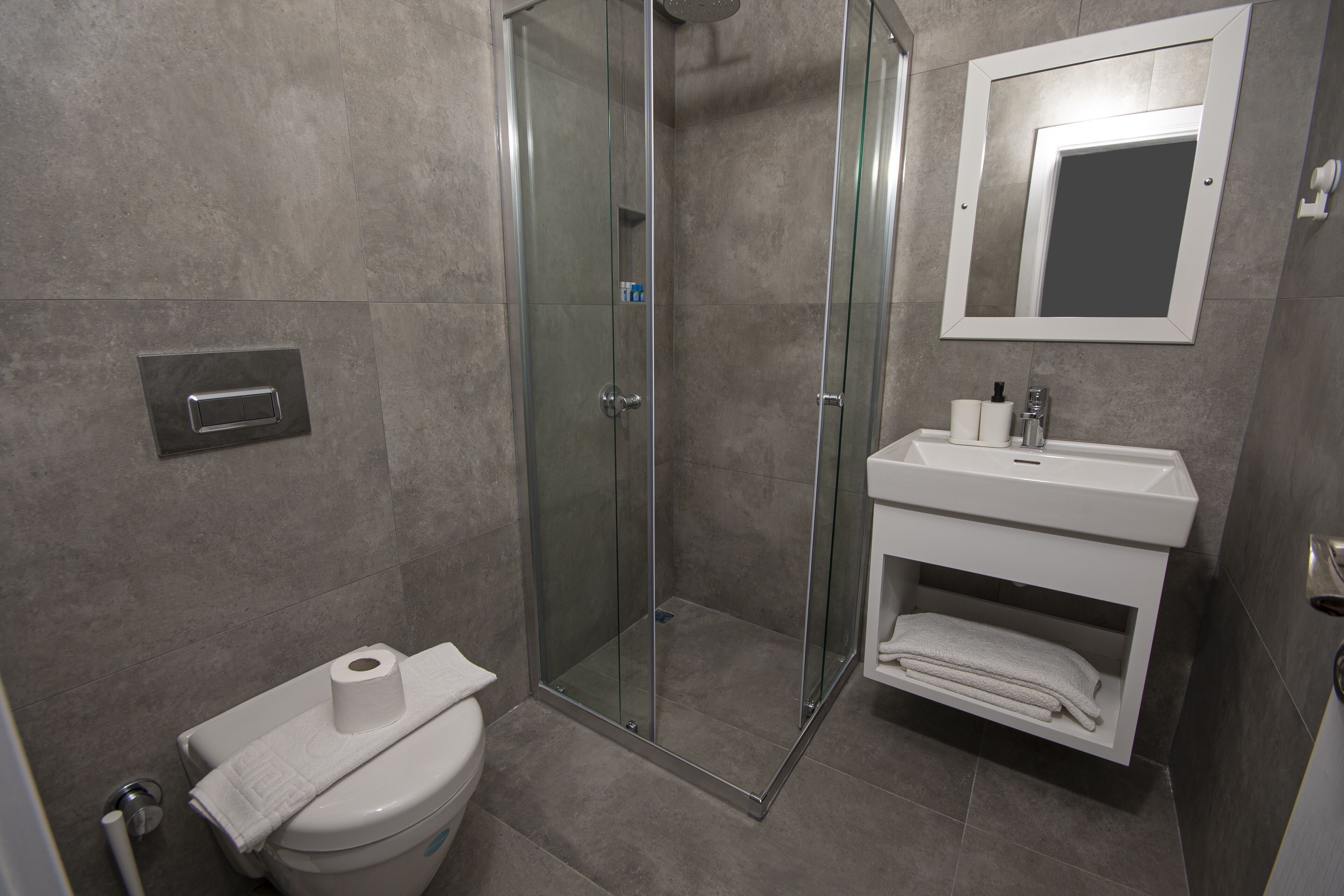 shower, free toiletries, hair dryer, slippers