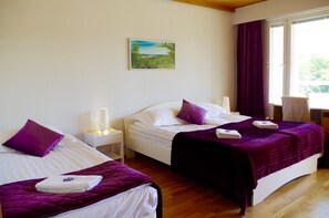 Premium bedding, desk, blackout drapes, iron/ironing board