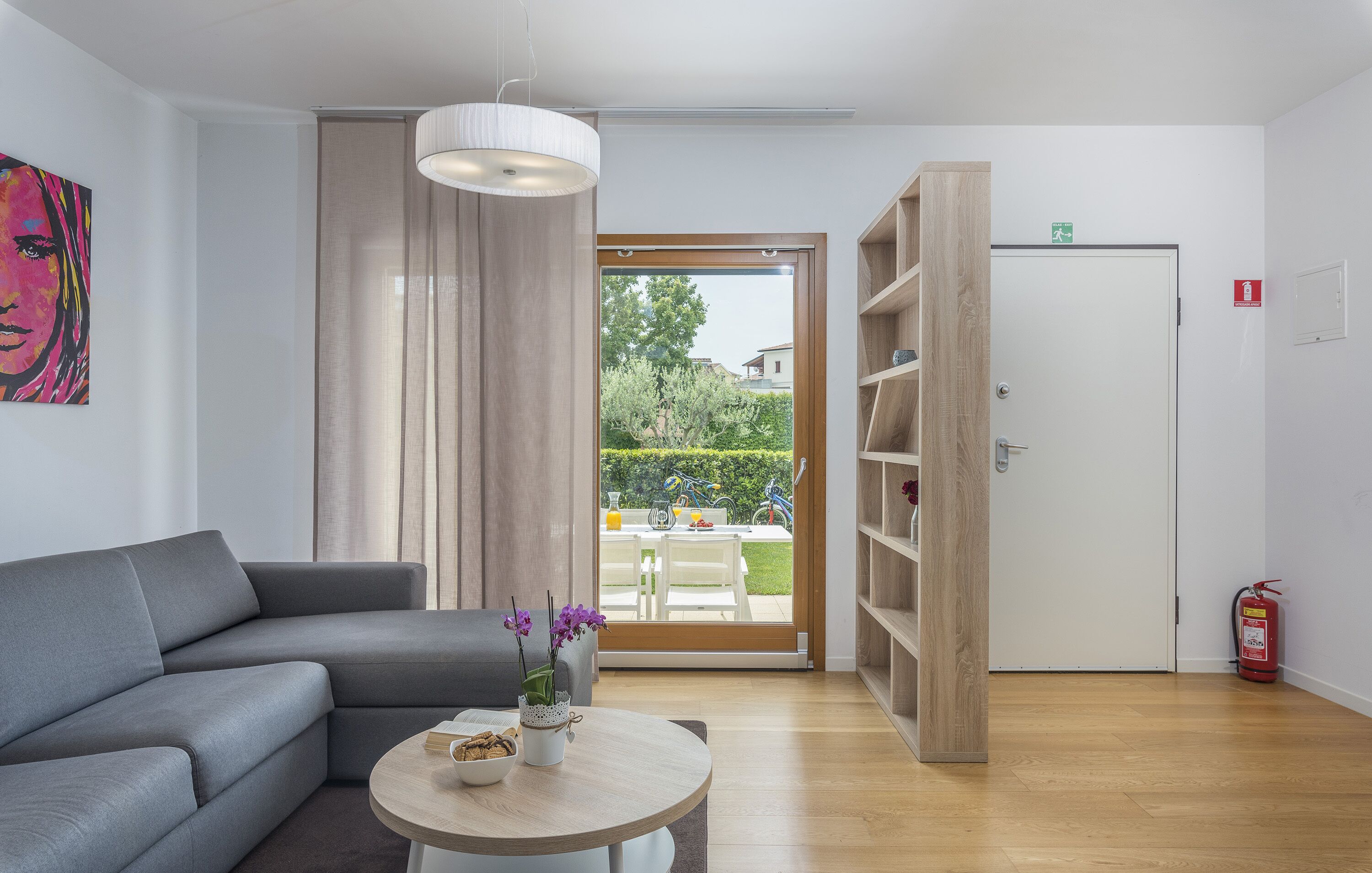 Premium Apartment, Garden View (Patio) | Living area | Flat-screen TV, foosball, stereo