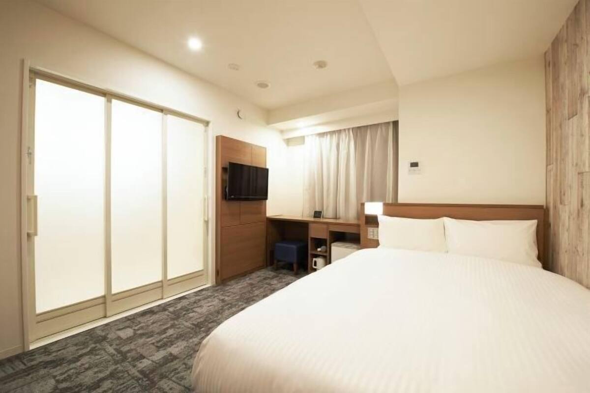 Desk, blackout curtains, iron/ironing board (on request), free WiFi