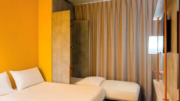 Triple Room, Multiple Beds | Desk, blackout drapes, soundproofing, iron/ironing board