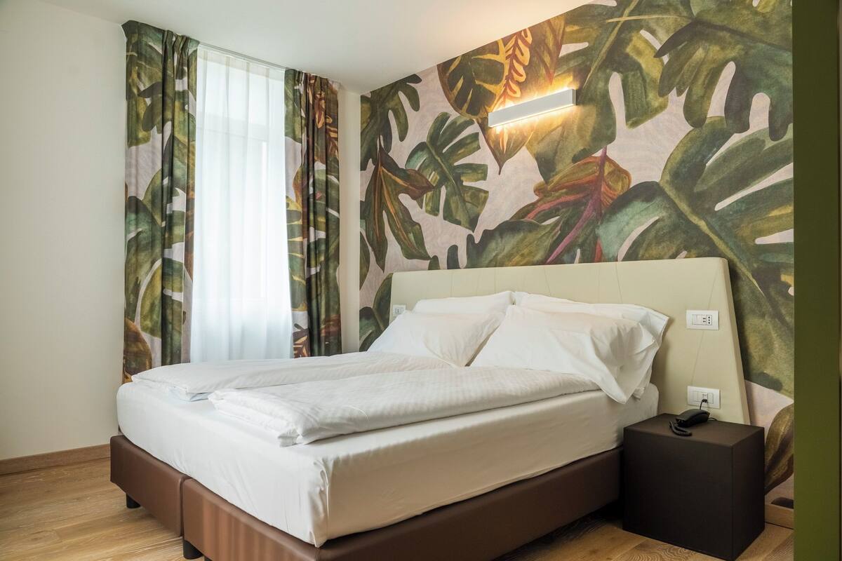 Suite queen con terrazza, POOP | Ropa de cama de alta calidad y caja de seguridad en la habitación