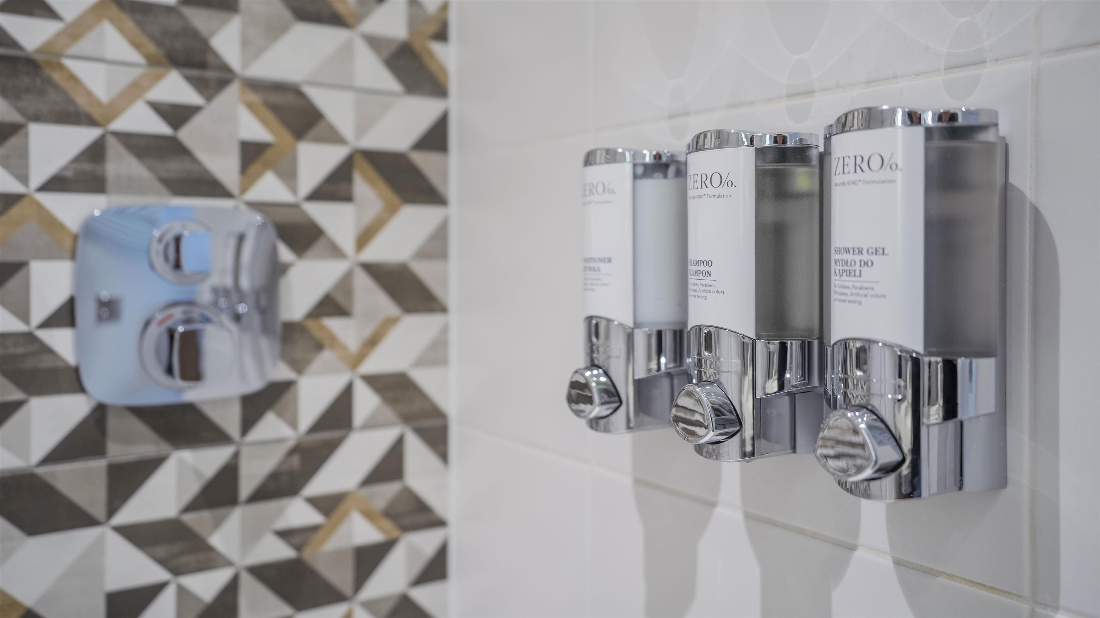 room, multiple beds | bathroom shower