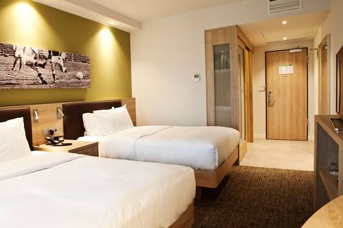 Twin Room, 2 Single Beds | In-room safe, blackout curtains, soundproofing, iron/ironing board