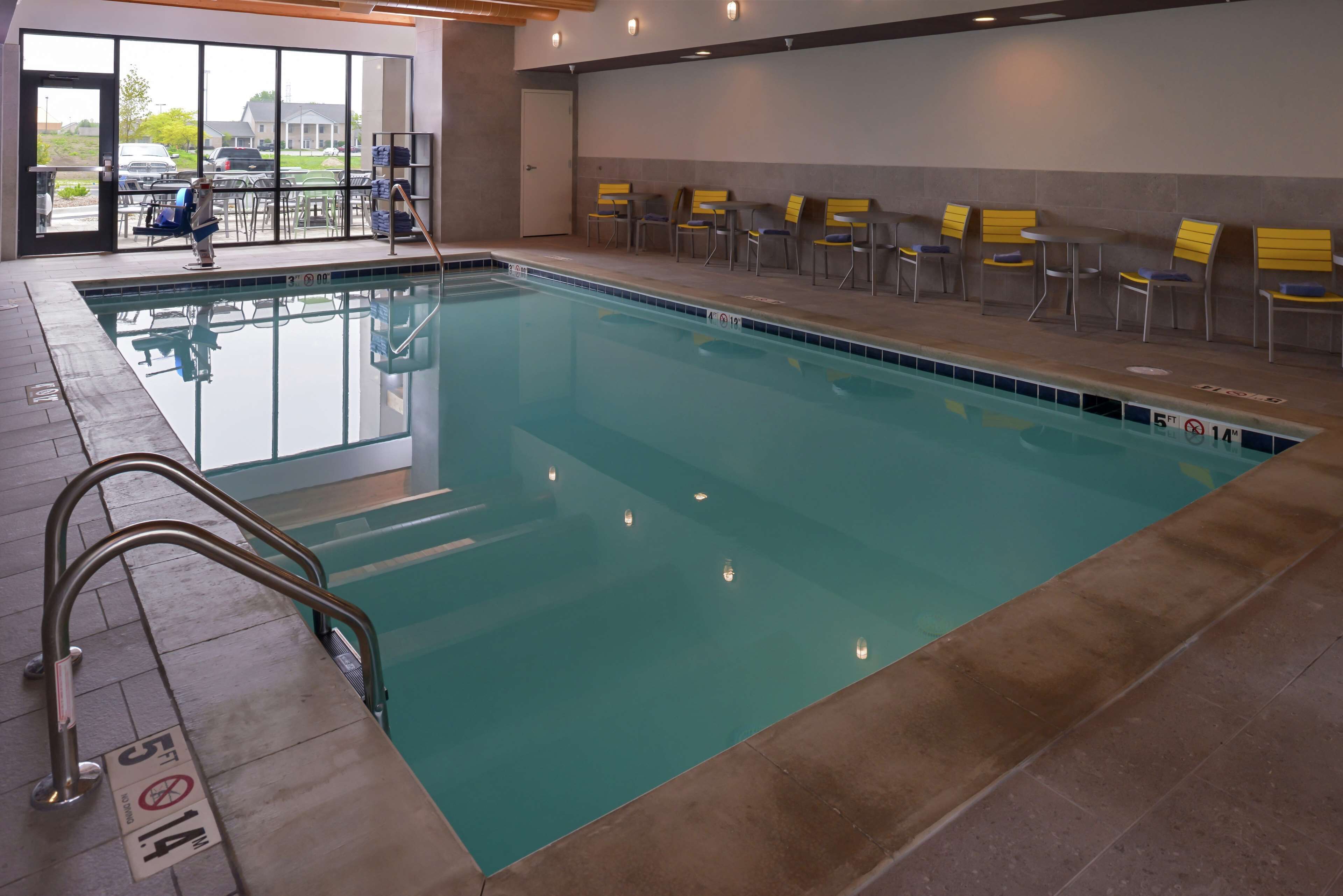 indoor pool, open 6 am to 11 pm, pool loungers
