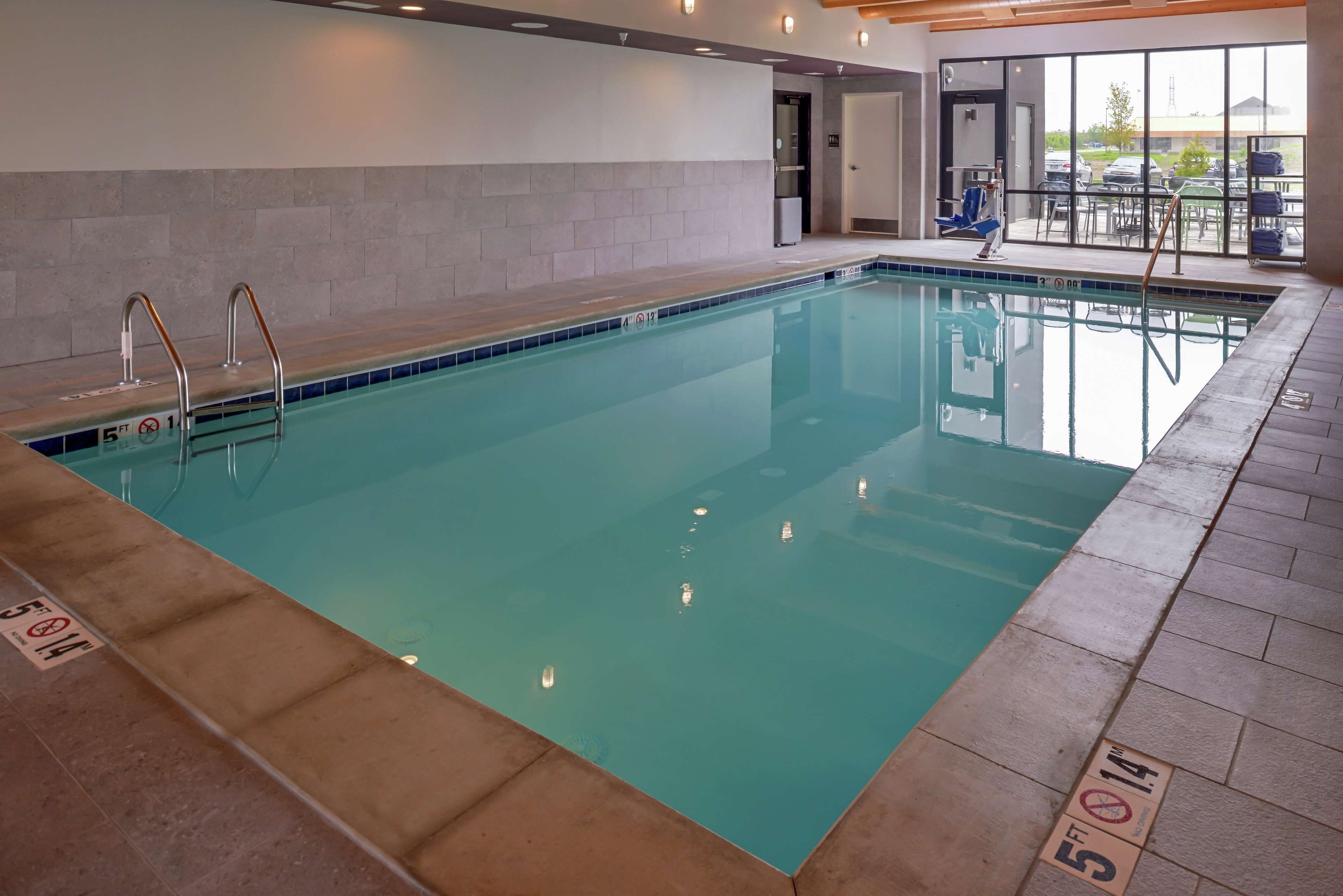 indoor pool, open 6 am to 11 pm, pool loungers