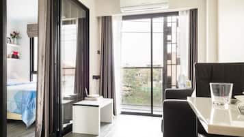 1 Bedroom City View | Living room | Flat-screen TV
