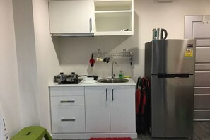 1 Bedroom Pool Access | Eget kjøkken | Kjøleskap, mikrobølgeovn, ovn og kokeplater