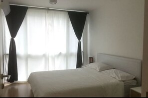 Business Condo, 1 Queen Bed with Sofa bed, Refrigerator & Microwave, Pool View | Living area | 40-inch LCD TV with digital channels, TV