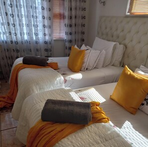 In-room safe, blackout curtains, iron/ironing board, bed sheets