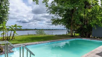 Outdoor pool, pool umbrellas, sun loungers