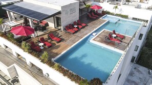 Outdoor pool, open 8:00 AM to 9:00 PM, pool umbrellas, pool loungers