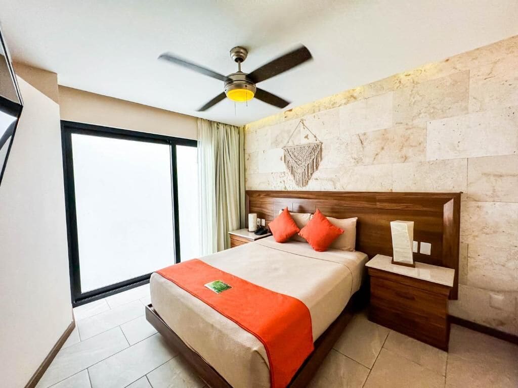 Hypo-allergenic bedding, down duvets, desk, laptop workspace