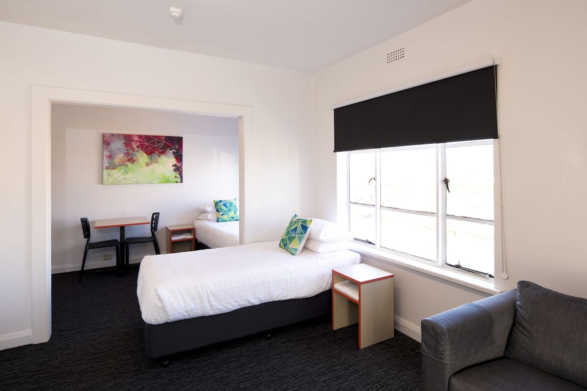 economy family with private bathroom | iron/ironing board, free wifi, bed sheets