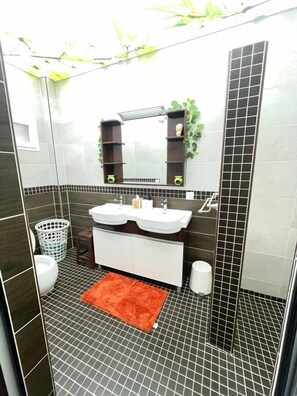 Shower, hair dryer, towels, soap