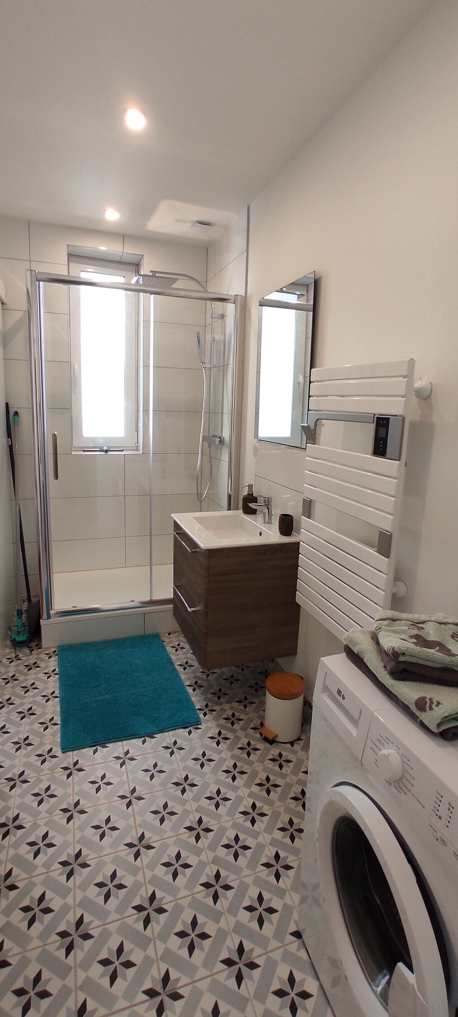 Bathtub, hair dryer, towels, soap