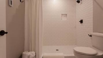 Shower, hair dryer, heated floors, towels