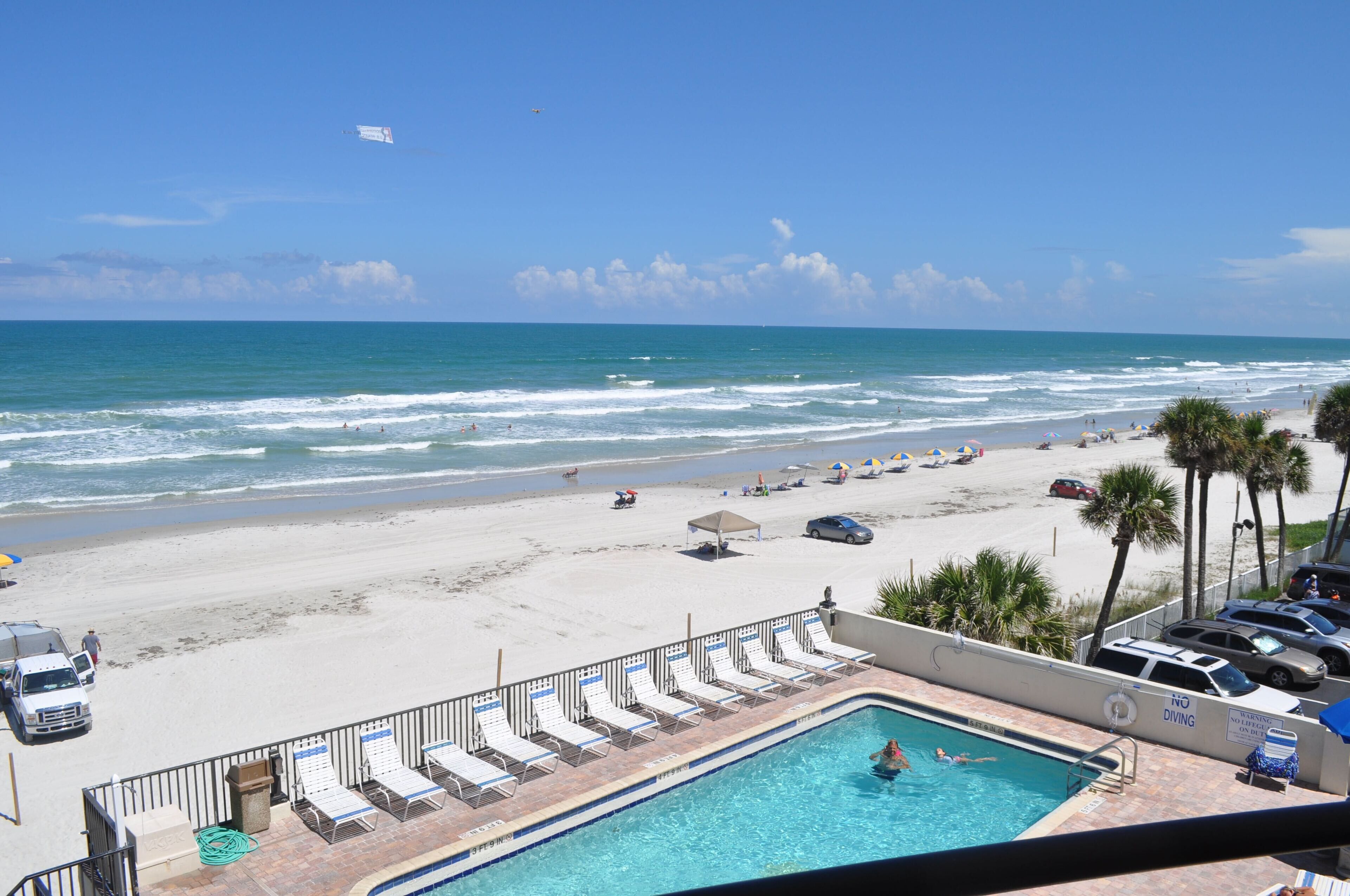 On the beach, sun loungers, beach towels