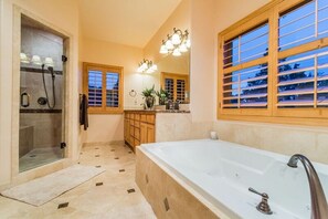 Combined shower/bathtub, jetted bath, hair dryer, towels