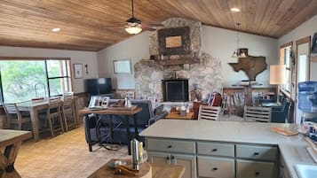 Smart TV, fireplace, table tennis, books