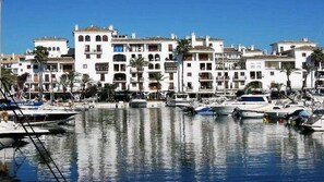 Stunning marina views with traditional Mediterranean architecture and picturesque boats.