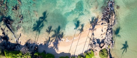 Una spiaggia nelle vicinanze, teli da spiaggia