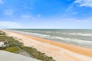 On the beach, sun-loungers, beach towels - DIRECT OCEANFRONT Luxury & Modern HIGH FLOOR Condo (Ormond Beach)