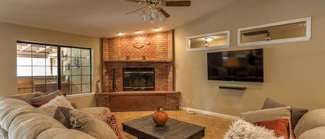 Smart TV, fireplace, table tennis, books