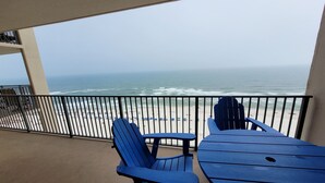 A balcony with a view of the beach and ocean. - Phoenix10 Beach front condo fully upgraded with brand new custom bathrooms. (Orange Beach)