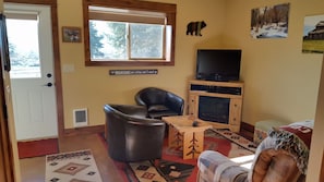 TV connectée, cheminée, lecteur de DVD, vidéothèque