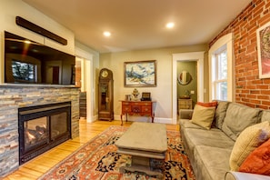 Smart TV, fireplace, books