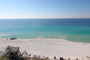 On the beach, sun-loungers