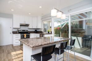 Fridge, microwave, oven, stovetop - Family-Friendly Home Near Beaches, La Jolla & UCSD (San Diego)