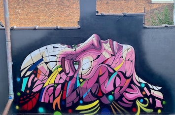 NEW! Zak Butler mural (view from patio) entitled "The Muse of SoHo"