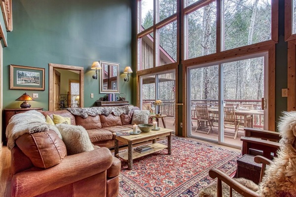 Spacious living room overlooking the river