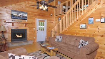 Flat-screen TV, fireplace, foosball