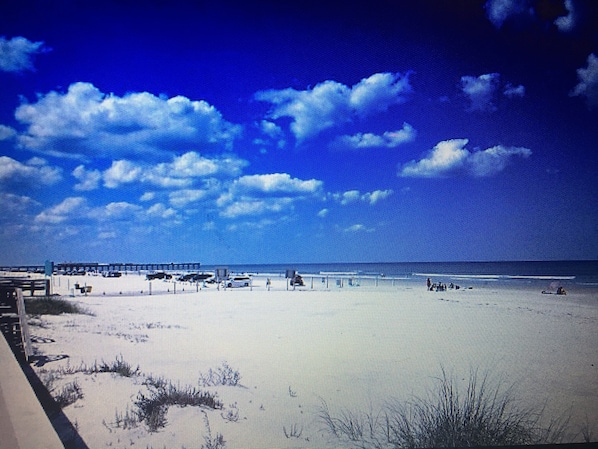 On the beach, sun loungers, beach towels