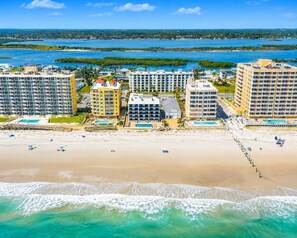 On the beach, sun-loungers, beach towels - Beautiful Spacious, 3/Bed 2/B, No Drive Beach, Heated Oceanfront Pool, Pets OK! (Daytona Beach Shores)