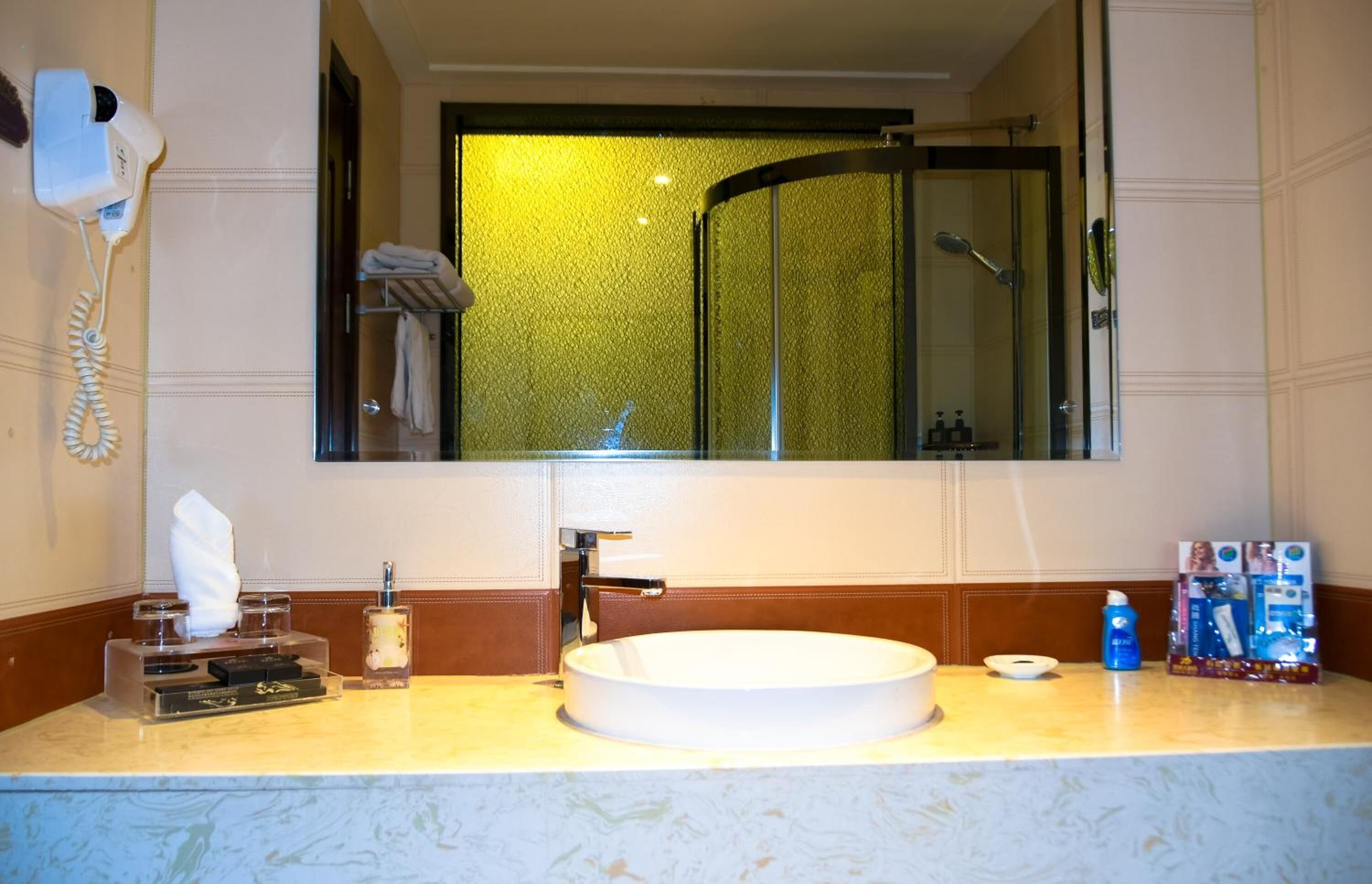 shower, free toiletries, hair dryer, slippers