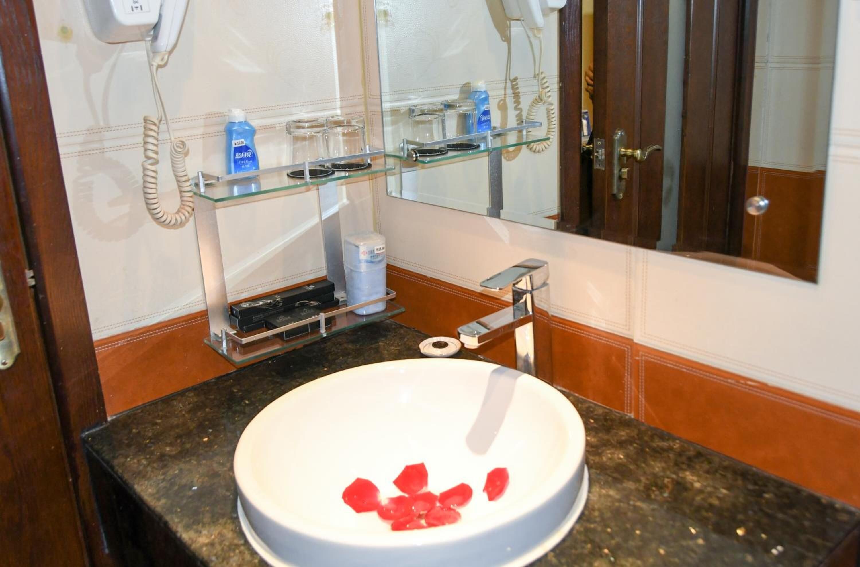 shower, free toiletries, hair dryer, slippers