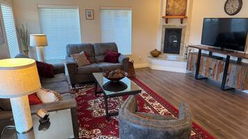 Smart TV, fireplace, DVD player, books