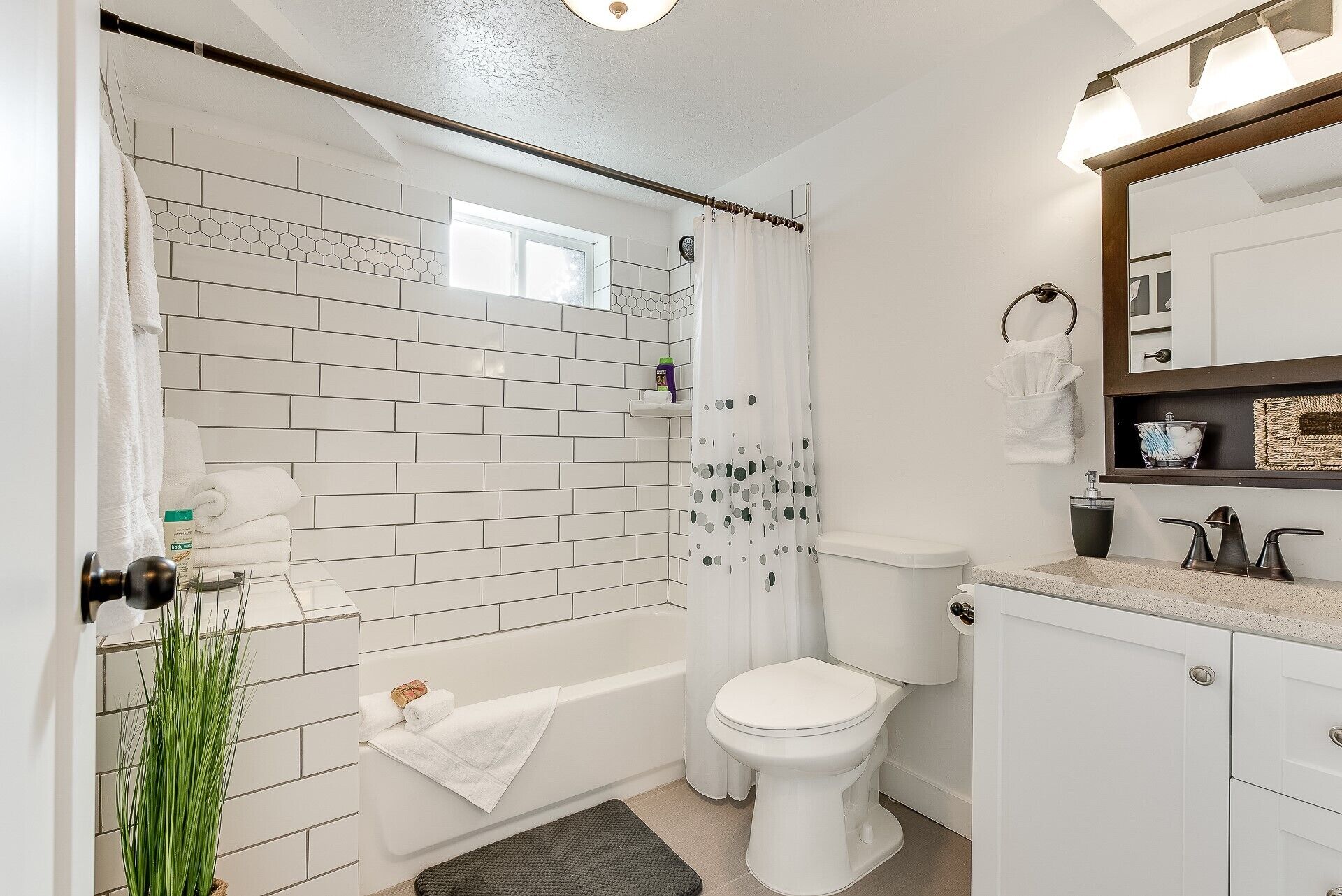 Combined shower/tub, hair dryer, towels, soap
