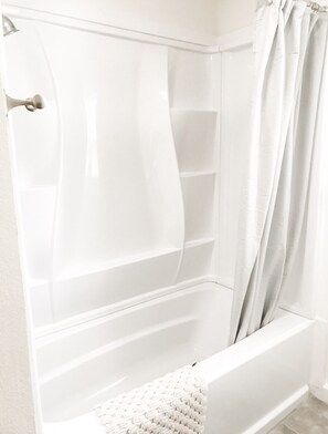 Combined shower/bathtub, hair dryer, towels, soap - Fort Grounds Cottage Across from City Beach, Park & Downtown! (Coeur d'Alene)