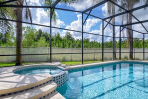 Outdoor pool, a heated pool - Large 6BR Home, Close to Disney! Private Pool & Movie Theater, Gated (Kissimmee)