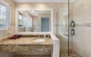 Combined shower/bathtub, hair dryer, towels, soap
