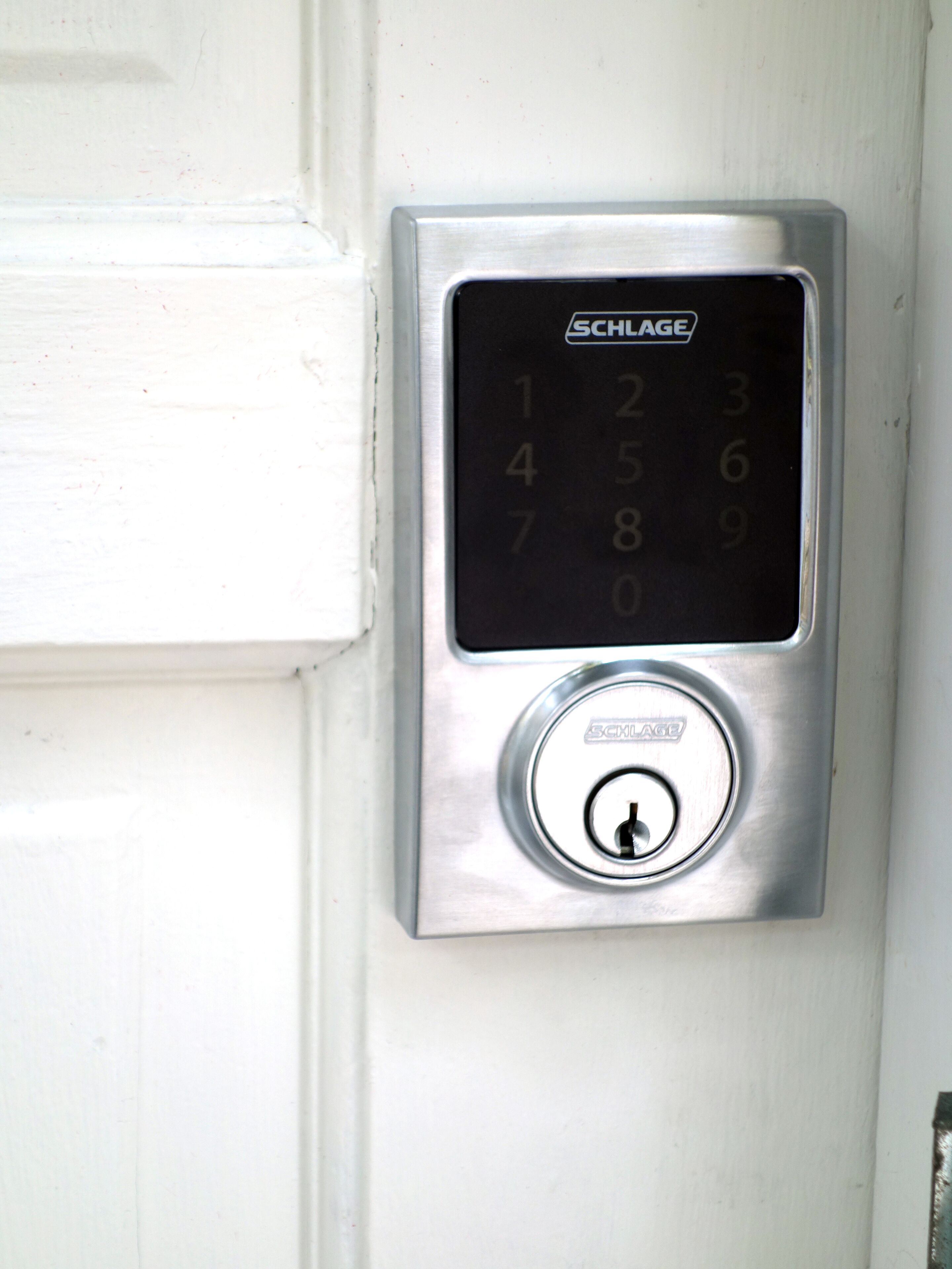 A SCHLAGE electronic keypad door lock.