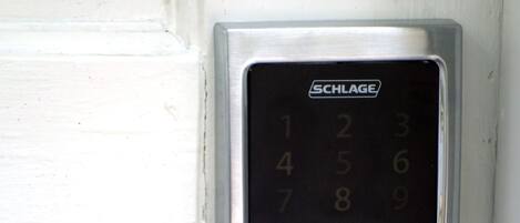 A SCHLAGE electronic keypad door lock.