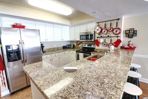 Fridge, microwave, oven, stovetop - Pristine Condo at Beachwalk Villas in North Myrtle Beach, SC Cherry Grove. (North Myrtle Beach)